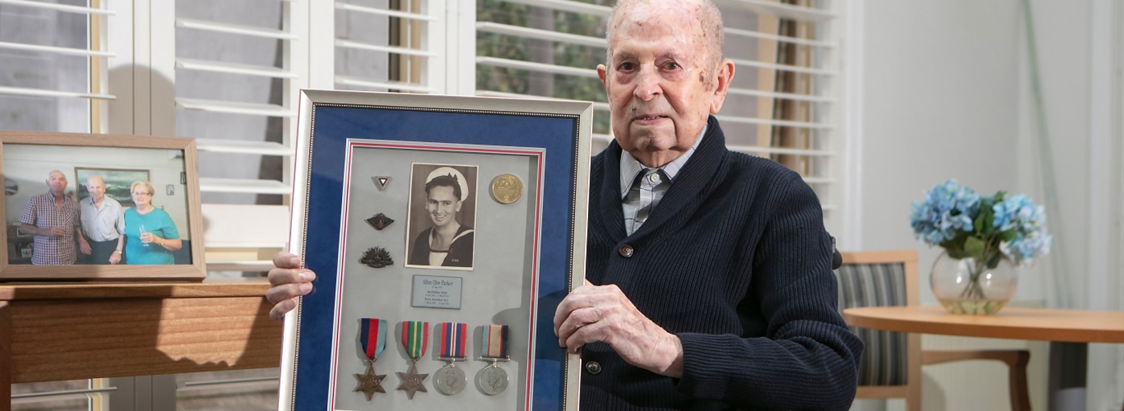 An elderly gentleman with his War medals An elderly gentleman with his War medals