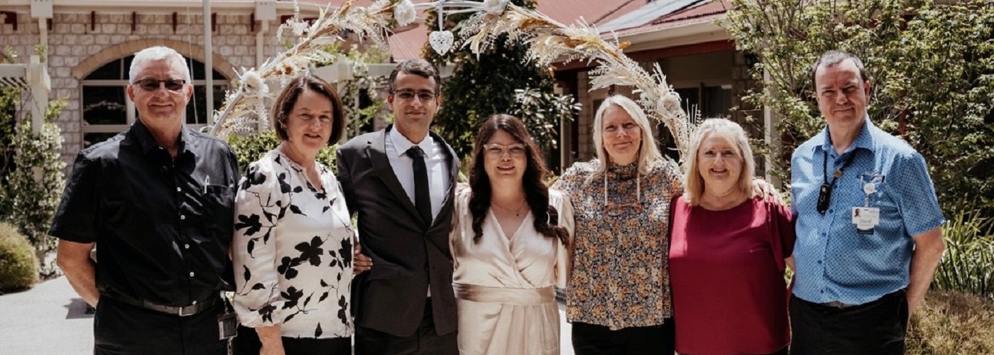 Raffles team and the happy couple on their wedding day