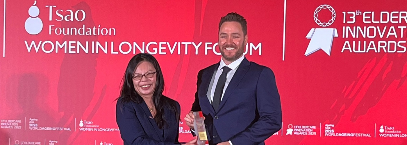 Bolton Clarke Chief Operating Officer Residential Aged Care Glenn Hancock accepting the award