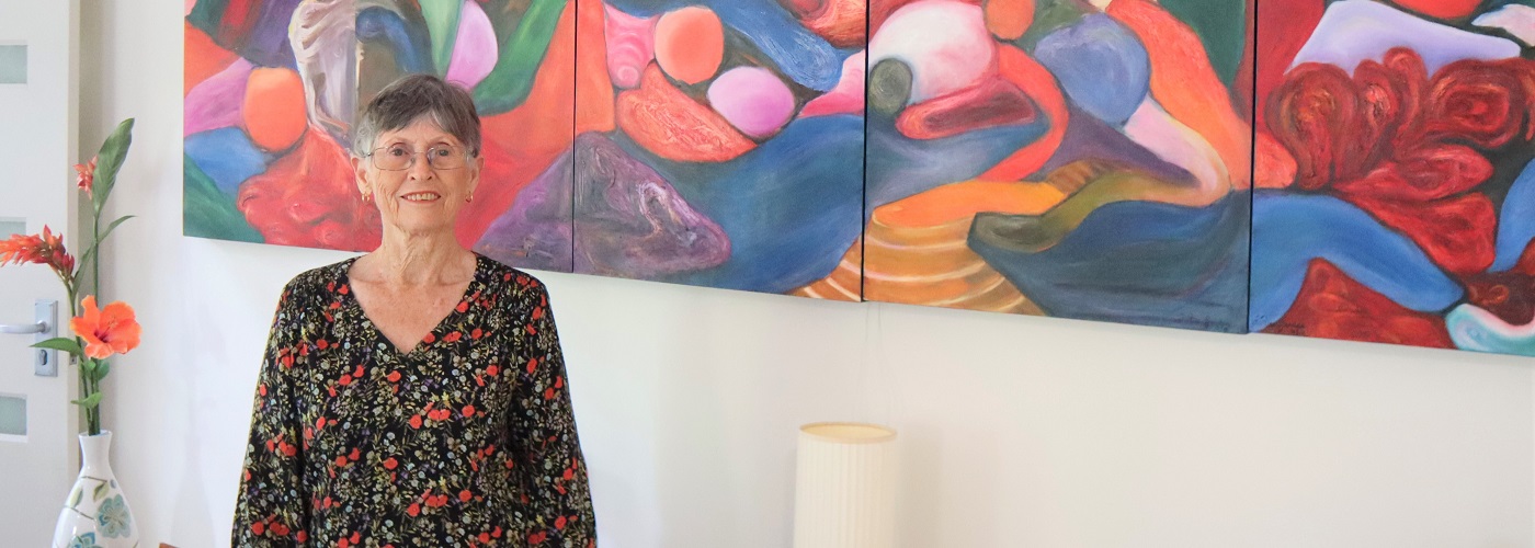 Frances leads fellow residents in art class. 