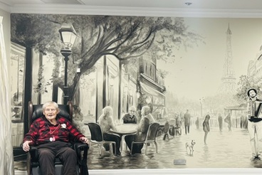 Hans with the Paris mural_.jpg