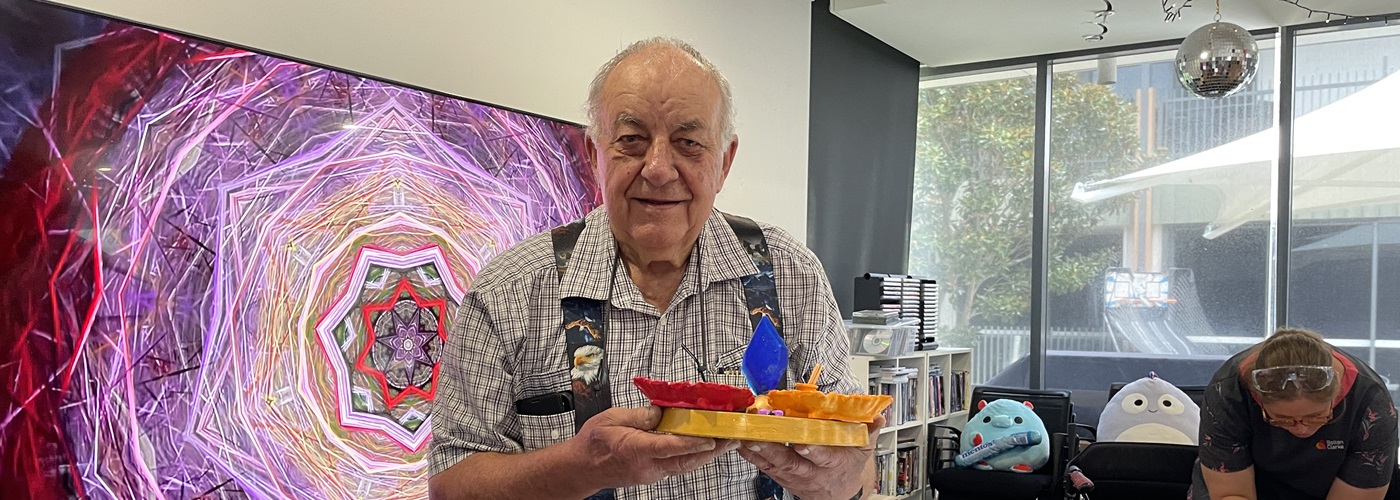 Ian showcasing his handmade crystals.jpg