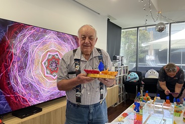 Ian showcasing his handmade crystals_.jpg