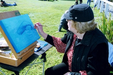 Janice painting on the shore of Norah Heads_.jpg