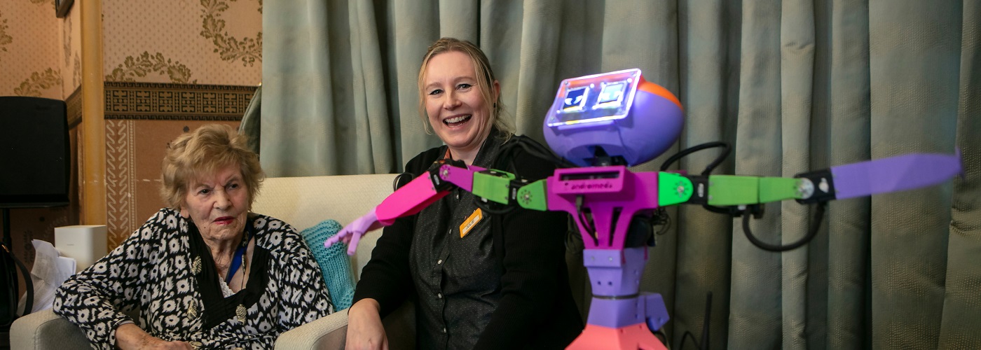 Julie and ABI the robot.jpg
