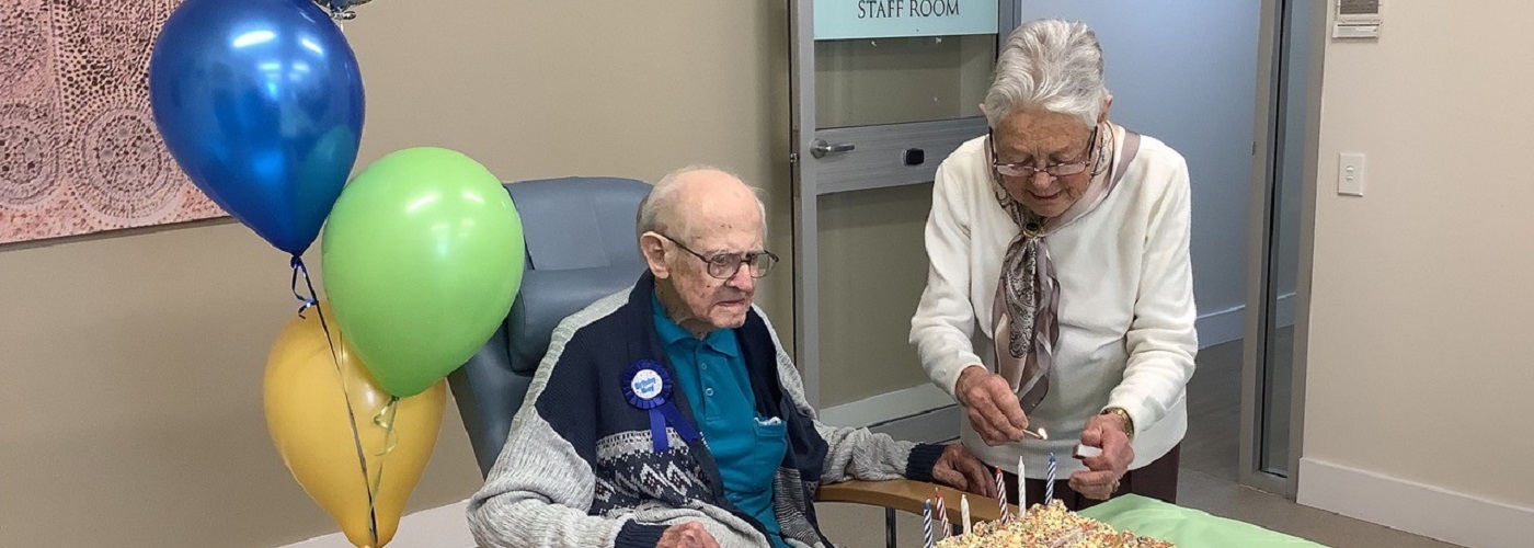Mervyn and his wife celebrating his birthday together