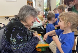 Milford Grange resident and Winston Glades Early Education student_.jpg Milford Grange resident and Winston Glades Early Education student_.jpg
