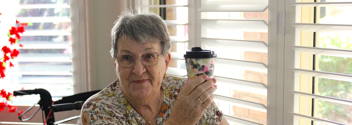 Roma enjoying her coffee.jpg