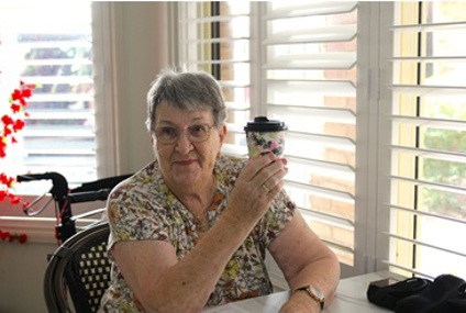 Roma enjoying her coffee_.jpg Roma enjoying her coffee_.jpg