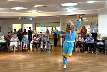 Team members performing for residents_.jpg