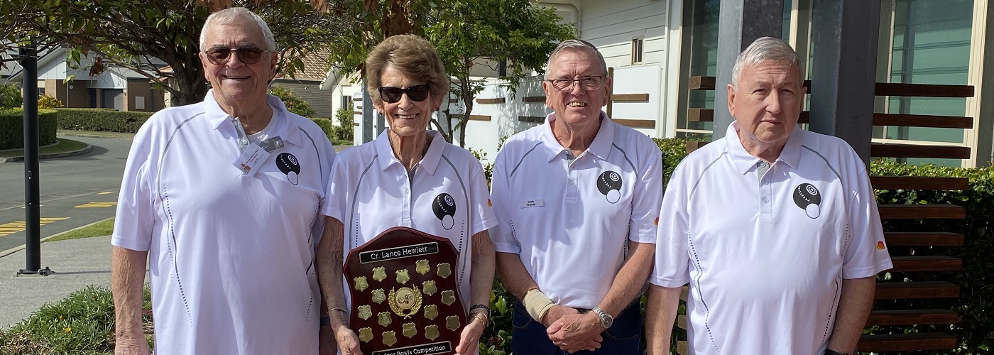 The Moreton Shores Bowls Team and their trophy.jpg