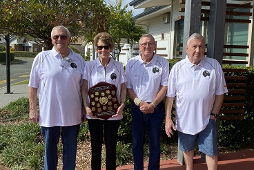 The Moreton Shores Bowls Team and their trophy_.jpg