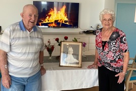 Celebrating their wedding anniversary together Celebrating their wedding anniversary together